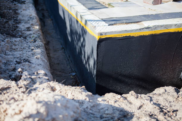 Professional Foundation Crack Repair technician working in Laura, OH